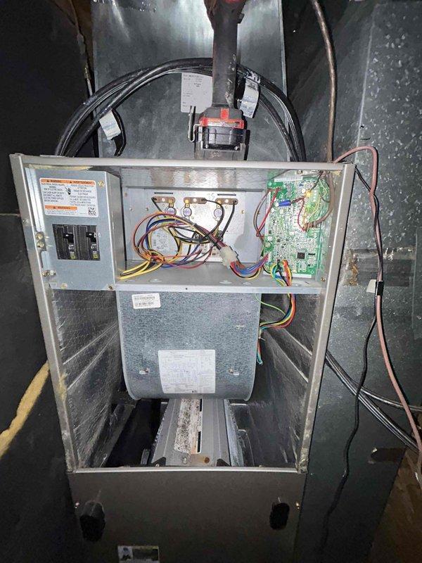 Completed Club Green preventive maintenance tune-up on heat pump and air handler system located in crawlspace. Performed comprehensive inspection of air handler unit, verifying proper operation of control board, electrical connections, and blower assembly. Customer provided their own air filter for the system. All components found operating within normal parameters, with wiring connections secure and control systems functioning properly.