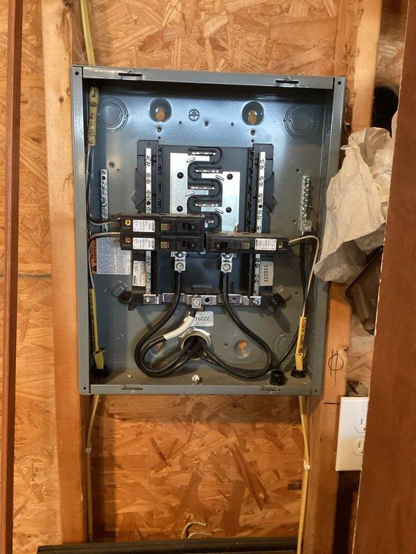 Completed electrical estimate for Level 2 car charging station installation at residential property with customer-supplied charger. Assessed existing electrical panel capacity, determined optimal routing for dedicated 240V circuit from main breaker box through exposed wall framing to proposed charging location, and documented current electrical infrastructure including available breaker positions and wire pathways for future installation work.
