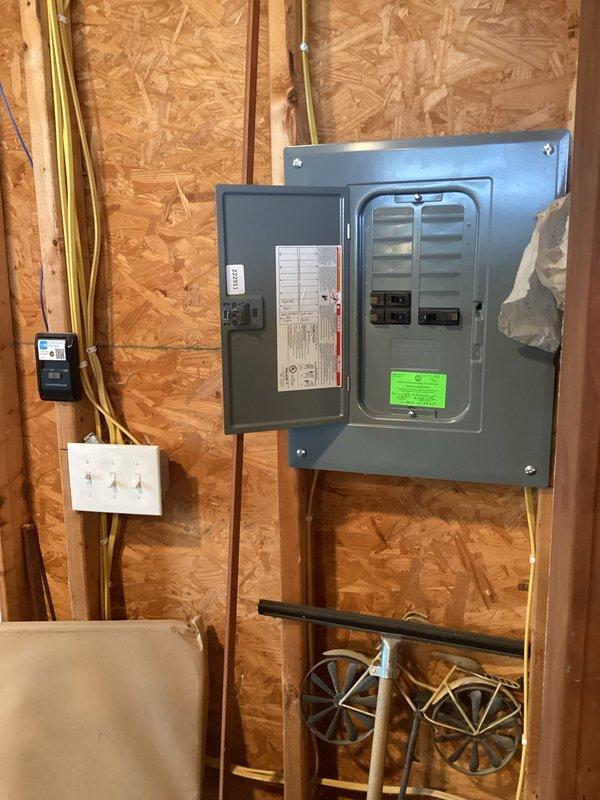 Completed electrical estimate for Level 2 car charging station installation at residential property with customer-supplied charger. Assessed existing electrical panel capacity, determined optimal routing for dedicated 240V circuit from main breaker box through exposed wall framing to proposed charging location, and documented current electrical infrastructure including available breaker positions and wire pathways for future installation work.