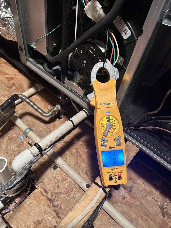 Completed routine maintenance inspection on three-year-old air conditioning system as part of preventative maintenance agreement. Performed comprehensive tune-up including visual inspection of attic-mounted air handler and ductwork, electrical testing of system components using clamp meter to verify proper amperage draw and voltage levels, and verification of all mechanical operations. System found operating within manufacturer specifications with no deficiencies noted. Unit maintained in good working condition.