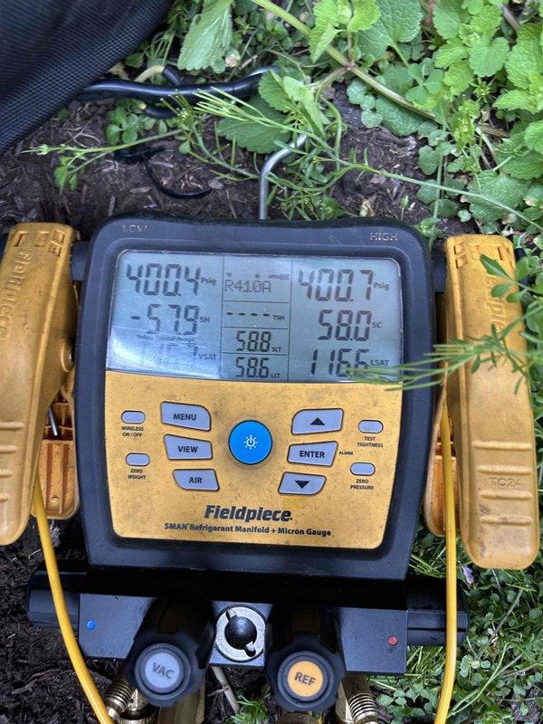 Completed TXV replacement on residential HVAC system with successful refrigerant recovery and reuse. Performed system evacuation, installed new thermostatic expansion valve, and recharged system with recovered refrigerant. Verified proper system operation with manifold gauge readings showing appropriate pressures and confirmed supply air temperature of 65.3°F at ductwork, indicating adequate cooling performance.