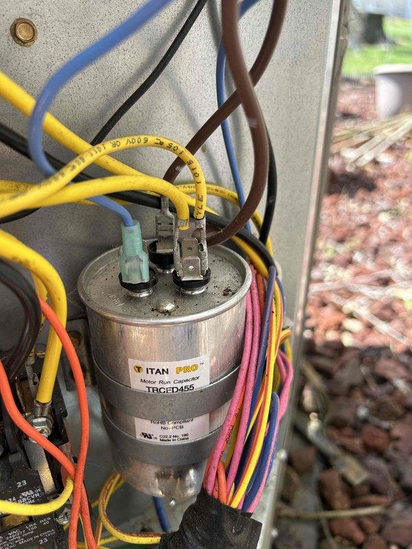 Completed comprehensive care plan tune-up on heat pump and air handler system. Performed electrical diagnostics using clamp meter, recording amperage draw of 17.1 amps, and inspected TITAN PRO TRCFD455 capacitor with all wire connections secure and functioning properly. System tested and operating within normal parameters with customer-provided filter in place.