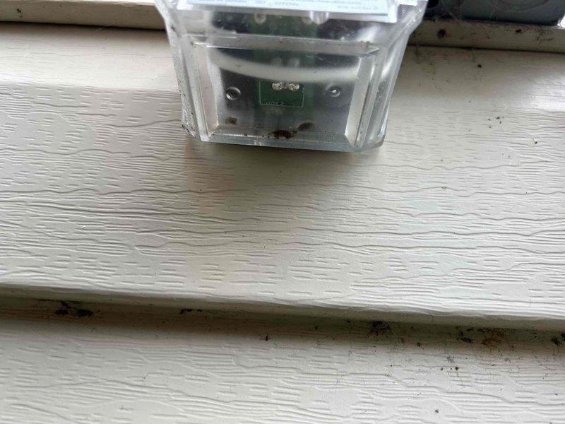 Responded to system fault error displayed on heating and cooling unit while system remained operational. Inspected air handler unit in utility closet, verified refrigerant lines and electrical connections, and confirmed outdoor sensor module was properly mounted and functioning. Checked air filtration system and determined all components were operating within normal parameters despite error code display.