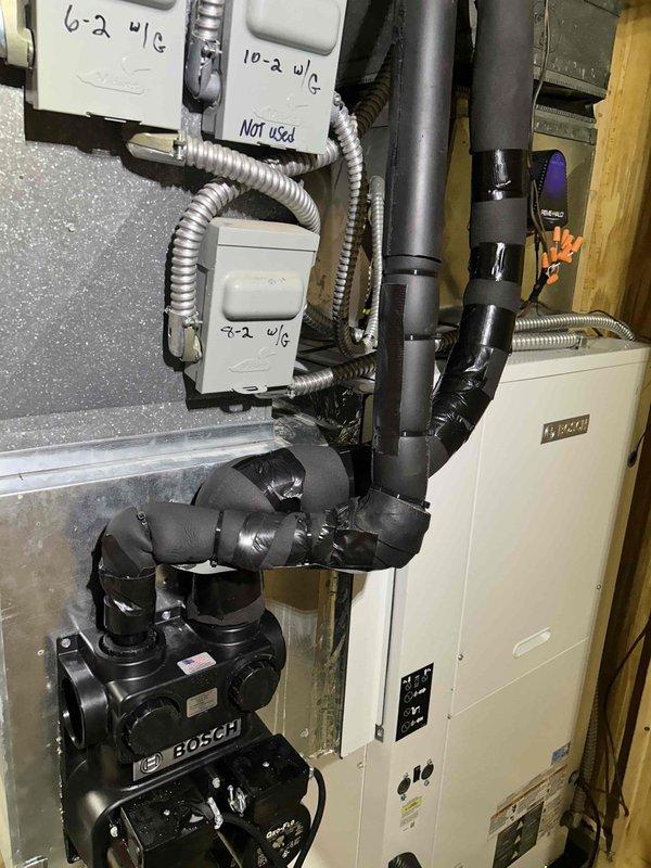 Completed first-year warranty repair on geothermal flow center by replacing a weakened fitting connection toward the loop field that may have been compromised during the original installation of the new flow center. Flushed the entire system using flush cart to ensure proper operation and remove any debris. All necessary materials and tools were retrieved from shop inventory to complete the repair, with photographic documentation taken of the mechanical room installation including the flow center, associated piping, electrical junction boxes, and system components.