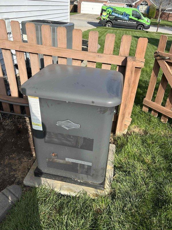 Completed scheduled maintenance on a Briggs and Stratton Fortress 12kW standby generator, serial number 4000159080. Performed comprehensive inspection of unit exterior, verified proper mounting on concrete pad, checked electrical connections at transfer switch and meter assembly, and documented equipment condition with photographic records per maintenance protocol.