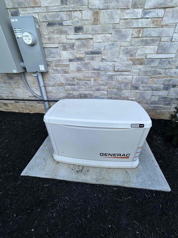 Completed first maintenance service on residential Generac backup generator system installed on exterior stone wall. Performed comprehensive inspection of generator unit, transfer switch, and associated electrical connections. Verified proper operation of all components, checked fluid levels, inspected air filtration system, and tested automatic transfer switch functionality. Generator system operating within manufacturer specifications with no issues identified during this initial maintenance visit.