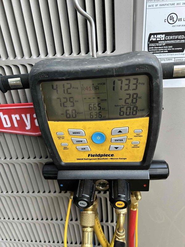 Responded to no-cooling complaint on 3-year-old electric heat pump system potentially damaged during recent ice storm. Performed Club Duo maintenance on heat pump and gas furnace units located in attic and crawl space. Utilized digital manifold gauges to diagnose refrigerant system, measuring operating pressures and temperatures on both high and low sides of the system. Inspected copper refrigerant lines showing heat discoloration and oxidation at service port connections. Completed comprehensive maintenance procedures including system performance evaluation, refrigerant charge verification, and visual inspection of all accessible components. Customer-provided filters were due for replacement during service visit. System diagnostics and maintenance performed to restore cooling functionality and ensure proper operation for upcoming cooling season.
