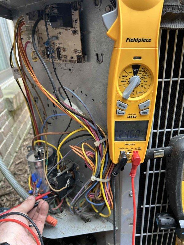 Completed scheduled Care Plan tune-up on attic-mounted air conditioning and gas furnace system. Performed comprehensive diagnostic testing using digital multimeter to verify electrical components and system operation. Inspected and tested capacitor, control board connections, and all electrical circuits to ensure proper voltage and functionality. All components found operating within normal parameters and system running efficiently.