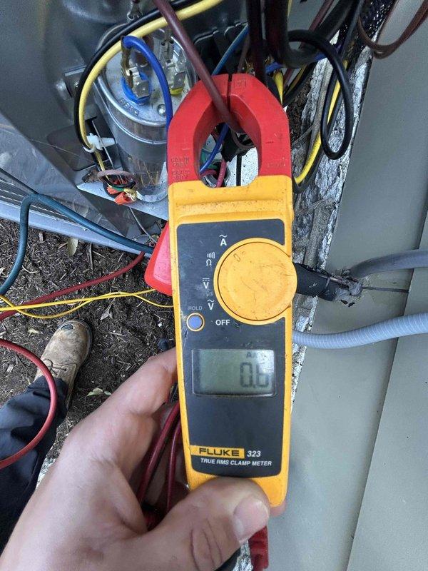 Completed Care Plan tune-up on gas furnace and air conditioning system located in basement. Performed comprehensive system inspection, checked thermostat settings per customer request, and investigated reported loud blower noise that has been present since installation. Utilized Fluke 323 True RMS Clamp Meter to verify electrical readings and test capacitor function. Customer provided replacement air filter which was inspected and documented.