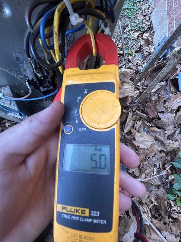 Completed preventive maintenance tune-up on air conditioning system and gas furnace unit located in basement at bottom of steps. Performed comprehensive electrical diagnostics using clamp meter to verify system amperage draw, recording 50 AAC on primary circuit and additional measurements on secondary components. Inspected capacitor and electrical connections, noting all wiring intact with proper terminations. Observed 16x25x1 filter supplied by customer. All electrical measurements within manufacturer specifications, system operating normally upon completion of service.