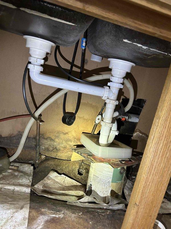 Responded to a water leak under the kitchen sink caused by separated PVC drain pipes in the dual-basin assembly. Reconnected the disconnected drain pipes, secured all connections, and tested the system to ensure proper drainage without leakage. Restored full functionality to the sink and dishwasher drain system.