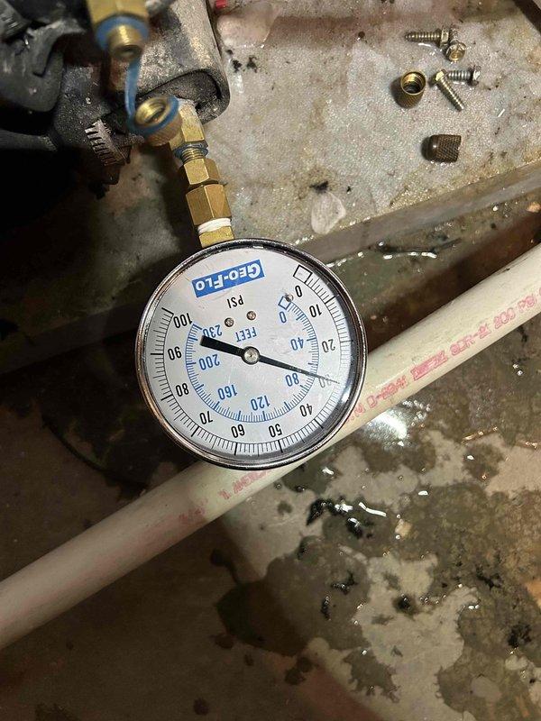 Responded to callback for non-operational HVAC system following previous service visit on 3/18. Performed diagnostic testing using refrigerant manifold and micron gauge to assess system pressures and temperatures across multiple units. Measurements indicated pressure readings of 253.3 psig and 84.3 psig with corresponding temperatures, confirming system operational status and proper refrigerant charge levels after troubleshooting.