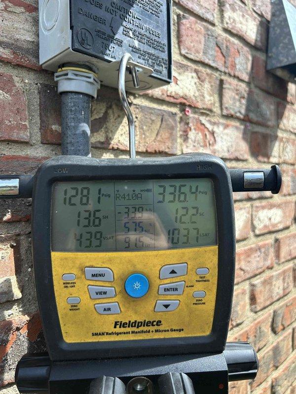 Responded to outdoor unit refrigerant leak. Located and repaired leak, evacuated system to proper vacuum levels, and recharged unit to manufacturer specifications. Verified system pressures and temperatures returned to normal operating range, with supply air temperature reading 55°F, confirming proper cooling operation restored.