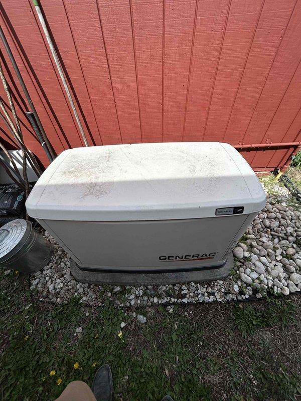 Completed scheduled maintenance on 11KW Generac standby generator, serial number 3003464229. Unit displayed 151.1 run hours on the Evolution 2.0 control panel at time of service. Performed standard preventative maintenance procedures including visual inspection of exterior housing, verification of control panel functionality across AUTO, MANUAL, and OFF modes, and confirmed proper operation of all interface buttons and LCD display. Generator remains in good operational condition with all systems functioning as designed.