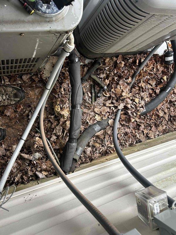 Completed Care Plan maintenance on dual air conditioning systems and dual gas furnace units located in attic and crawl space. Performed comprehensive inspection and routine maintenance procedures on both outdoor condenser units. Observed significant accumulation of dried leaves and organic debris surrounding both condensers, which was cleared to ensure proper airflow and system efficiency. Inspected refrigerant lines, electrical connections, and condensate drainage systems. All equipment operational at time of service completion.