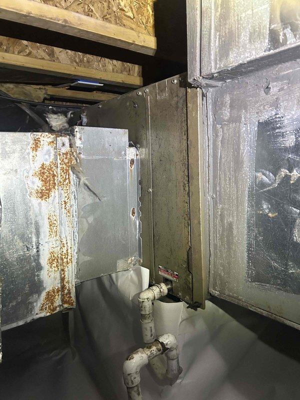 Completed care plan maintenance tune-up on geothermal heat pump system with air handler. Replaced multiple air filters including 16x20x1, 24x20, and 14x20 units that were taped together. Inspected geothermal system cover per home inspection concerns and documented missing cover with photos. Performed temperature measurements on supply ductwork, recording 68.1°F reading. Identified significant rust formation and corrosion on metal ductwork panels in basement utility area, indicating prolonged moisture exposure requiring attention. Documented rust streaking and deterioration on left duct panel with photographic evidence. Advised that any troubleshooting or repairs identified would require separate service call. This represented the final maintenance visit under the current care plan agreement.