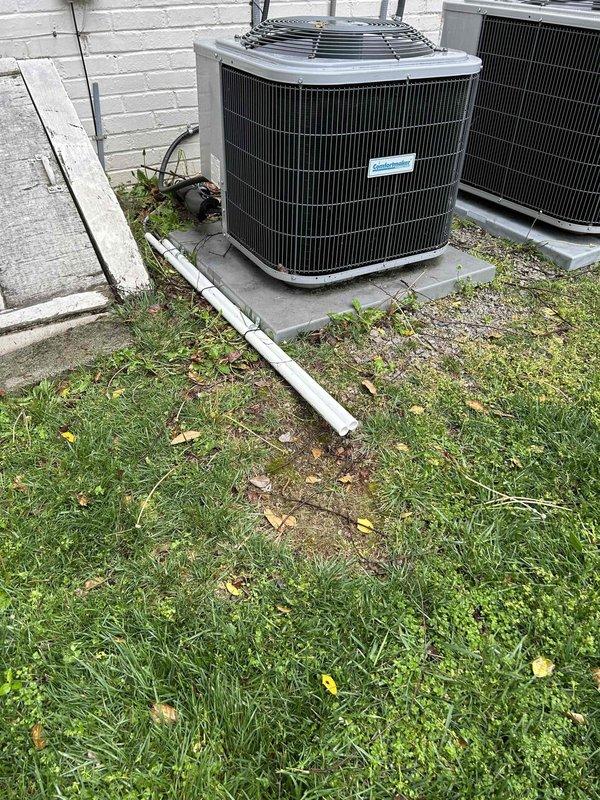 Completed comprehensive one-time tune-up service on three HVAC systems in preparation for property sale, including one attic-mounted unit and two crawlspace installations. Performed standard maintenance procedures including air filter replacement across all systems and full operational inspections. Addressed condensate management issues by repairing loose drain line connection at external condensate trap where water was pooling beneath furnace, then extended all condensate discharge lines away from foundation to prevent future moisture damage. Installed protective wire screening over exterior intake and exhaust PVC terminations to prevent wildlife and bird intrusion into combustion air and flue gas piping. All systems tested and confirmed operational following service completion.