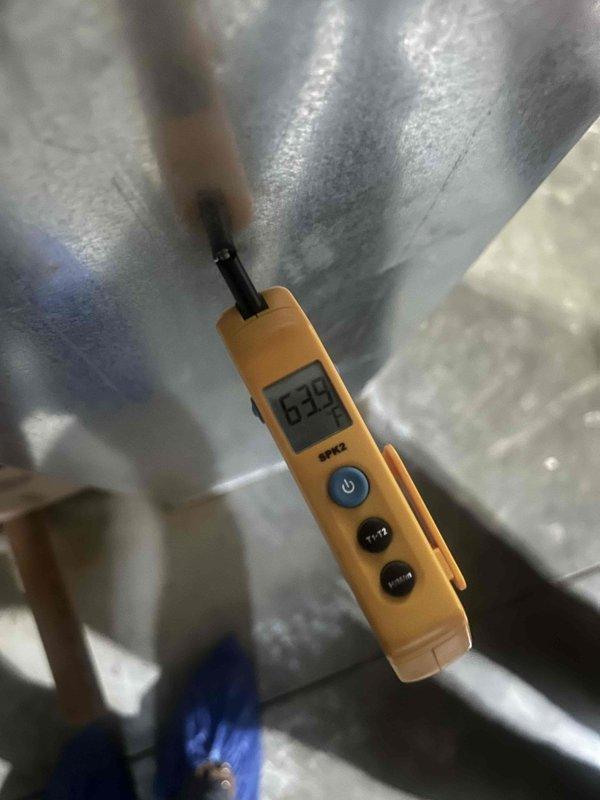 Responded to no-cool call on 6-year-old air conditioning system where outdoor unit failed to operate while indoor blower continued running. Performed diagnostic testing using digital multimeter to measure electrical values at outdoor unit and indoor air handler. Measurements revealed low microamp readings indicating potential control circuit failure or capacitor issue affecting compressor operation. Documented system conditions and electrical readings for further troubleshooting and repair recommendations.