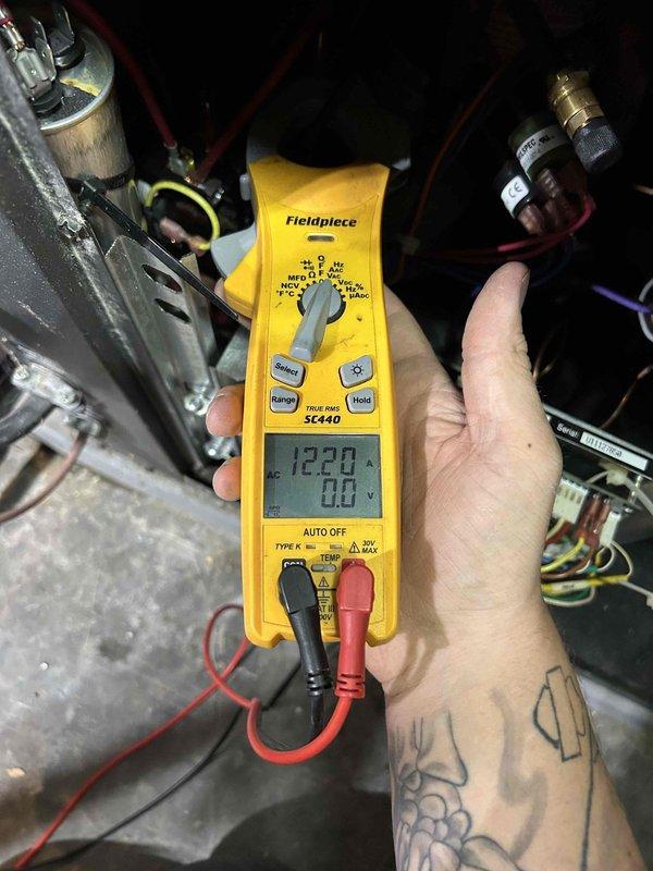 Performed comprehensive maintenance inspection on 10-year-old geothermal system with indoor unit located in walk-out basement for new homeowner. Conducted electrical diagnostics using multimeter to verify system operation, checked refrigerant pressures on geothermal loop system, and performed general cleaning and inspection of equipment. All system parameters found to be within normal operating range.