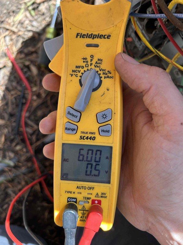Responded to no cooling complaint on upstairs air conditioning system. Upon arrival, performed diagnostic testing using digital meters to check electrical parameters and refrigerant temperatures. Measurements indicated system operating at 600 volts with 0.5 amp draw, and superheat reading of 58.5°F at the outdoor unit, suggesting potential refrigerant charge issue or restriction in the system. Further evaluation needed to determine root cause of cooling failure.