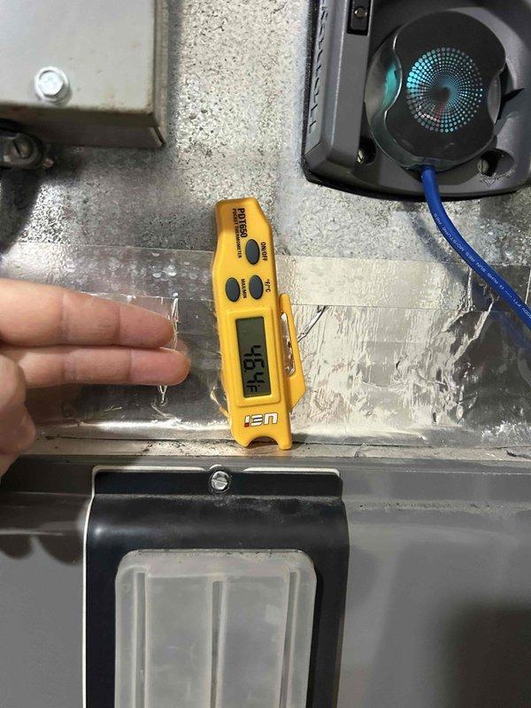 Responded to error code call and performed Gold Level prepaid maintenance tune-up on two heat pump systems in residential property. Upon arrival, system had been reset by customer and was operational. Completed comprehensive diagnostic testing on both units - one located in basement, one on second finished floor. Inspection revealed significant frost accumulation on evaporator coil, indicating potential refrigerant flow or airflow restriction issues. Measured electrical amperage at 18.8A and monitored system temperatures reading 53.3°F. Tested all electrical components including circuit breakers, capacitors, and wiring connections. Performed standard maintenance protocol including system performance verification, electrical testing with clamp meter, and visual inspection of all accessible components. Both systems operating at time of service completion. Customer provides own filters for units.