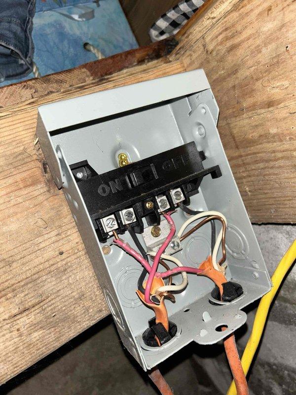 Responded to service call for two non-functioning electric water heaters in older home, each on separate electrical disconnect boxes. Inspected both exterior-mounted disconnect switches and verified breakers were not tripping. Found deteriorated wiring connections and corroded terminals in both disconnect boxes due to age and environmental exposure. Cleaned terminal connections, replaced damaged wire terminations, verified proper voltage supply to both units, and restored power to water heaters. Both units operational upon completion of electrical repairs.