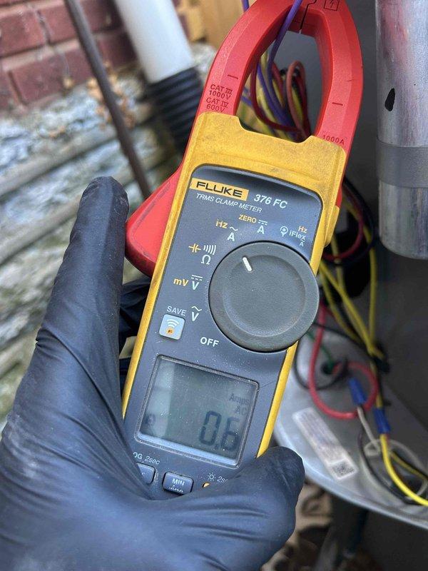 Completed comprehensive spring AC tune-up on dual heat pump/gas furnace system with units located in basement and attic. Performed electrical diagnostics using clamp meter to verify proper amperage draw on both systems, confirming compressor and blower motor performance within manufacturer specifications. Customer-supplied filters were installed, and all system components were inspected and tested to ensure optimal operation for the cooling season.