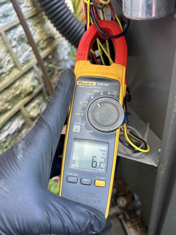 Completed comprehensive spring AC tune-up on dual heat pump/gas furnace system with units located in basement and attic. Performed electrical diagnostics using clamp meter to verify proper amperage draw on both systems, confirming compressor and blower motor performance within manufacturer specifications. Customer-supplied filters were installed, and all system components were inspected and tested to ensure optimal operation for the cooling season.