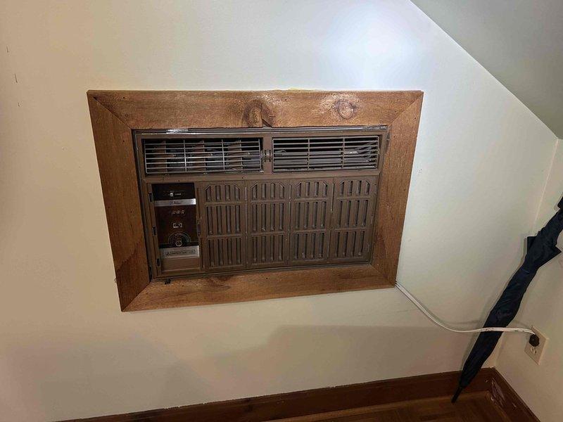 Completed routine maintenance on four air conditioning systems during morning appointment. Performed comprehensive AC tune-ups on all units, including two wall-mounted systems observed in upper-level spaces with wooden surrounds and vintage Emerson Quiet Kool equipment. Replaced air filters as specified: two 20x20x4 filters, one 16x25x4 filter, and cleaned one washable filter. Utilized 12-foot ladder to access elevated units. Inspected all system components, verified proper operation of controls and louvers, and confirmed adequate airflow through discharge vents. All systems operating within normal parameters upon completion of maintenance procedures.