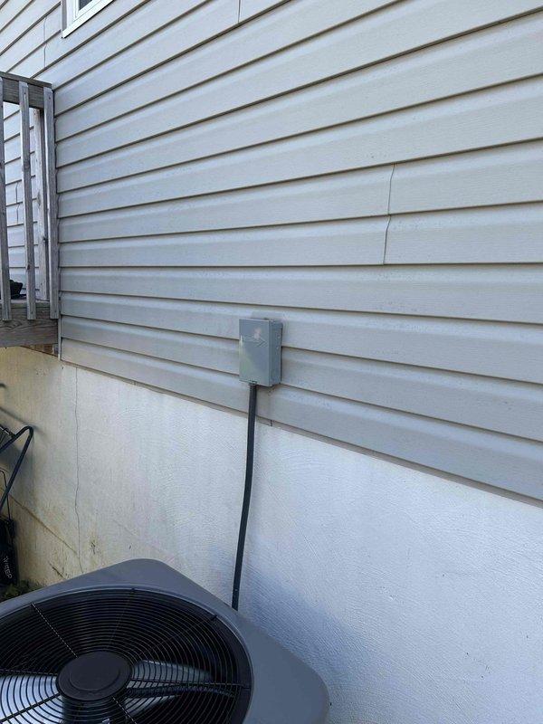 Completed full residential HVAC system installation featuring a RUUD 14.3 SEER2 2.5-ton two-stage heat pump (model RP14AY30AJ2NA) with matching 3-ton air handler (model RH2TY3617STANNJ) and 15KW heat kit (model RXBH-1724A15J-B). Removed and properly disposed of existing equipment, then installed outdoor unit on new pad with snow legs, electrical disconnect box, and whip kit. Installed air handler in mechanical room with refrigerant line insulation, refrigerant line filter, and transitions to existing ductwork. Added SS2 coil drain safety water sensor with trap and standard-sized air filter rack. Installed digital WiFi thermostat for system control. Completed all electrical connections with conduit and wiring per code requirements. Pulled applicable permits, performed system startup, tested all operations including two-stage heating and cooling functions, verified proper refrigerant charge, and confirmed thermostat programming and WiFi connectivity. System operating within manufacturer 