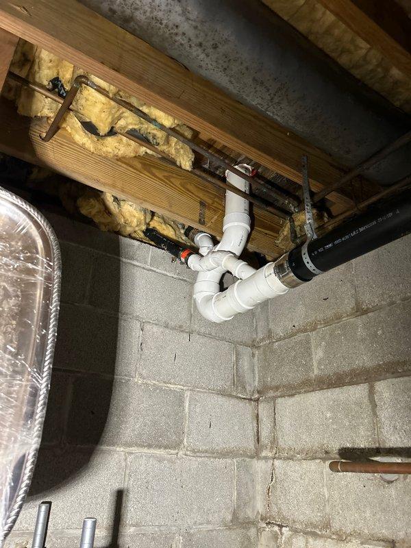 Responded to a toilet callback to address water drips in the basement drainage system. Replaced a defective section of drain pipe and associated fittings, including installation of a new toilet flange to eliminate leaks at the connection point. Completed drainage system repairs to restore proper function and prevent further water intrusion in the basement area.