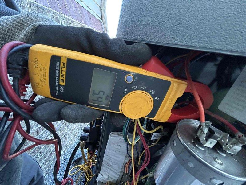 Completed comprehensive Care Plan tune-up on heat pump and air handler system located in attic space. Performed electrical diagnostics using clamp meter to verify proper amperage draws and electrical connections throughout the system. Measured and recorded temperature differentials across system components using infrared thermometer to ensure optimal heat transfer and system performance. Inspected all mechanical and electrical components, including capacitor, motor assemblies, and wiring connections. Customer will supply their own 16x20x1 air filter for the system. All tested components operating within manufacturer specifications at time of service.