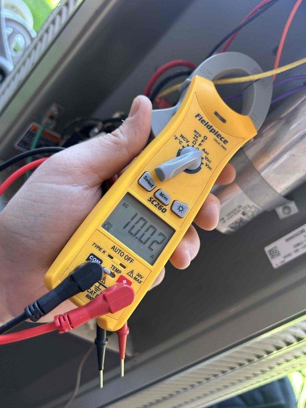 Completed annual air conditioning maintenance and tune-up for Care Plan member. Performed comprehensive system diagnostics including electrical testing with clamp meter to verify proper amperage draw and voltage levels. Inspected blower wheel assembly and housing, noting normal dust accumulation on fan blades consistent with seasonal operation. All electrical connections tested within manufacturer specifications, and blower motor operation verified for proper performance. System operating efficiently with no deficiencies requiring immediate attention.