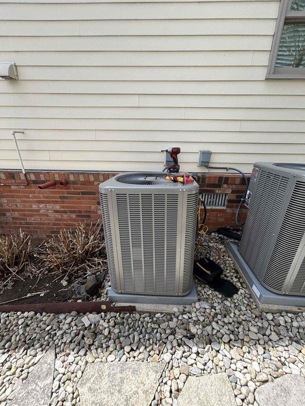 Completed preventative maintenance tune-up on two HVAC systems as part of Club Duo care plan, with one unit located in attic and one in crawlspace. Performed comprehensive inspection and diagnostics on outdoor condensing units, including electrical testing with clamp meter to verify proper amperage draw and system performance. Customer provided two 16x25x4 filters for installation during service. All equipment tested and operating within normal parameters upon completion.