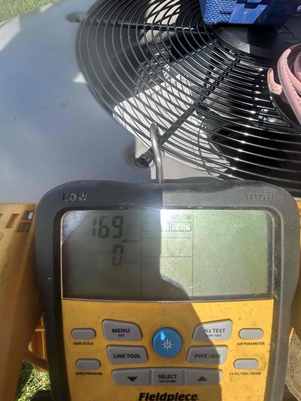 Completed full residential HVAC system installation including Lennox Elite 3-ton 17 SEER2 air conditioning unit (EL16KC1-036-230), evaporator coil (CK40HT-24A-71), and 66K BTU 80% efficiency gas furnace (ML180UH070E36AK). Installed complete duct system with extended plenum, foil flex supply runs to 13 white 4x10 ceiling registers, and return system featuring box plenum with foil flex runs to three 14x20 filter grilles mounted in ceiling. Ran refrigerant line set and PVC condensate drain along exterior wall, extended gas line through exterior wall into attic space for furnace connection. Installed digital programmable WiFi-enabled thermostat for system control. Performed system startup, charged refrigerant to manufacturer specifications, and verified proper airflow and combustion parameters using digital manifold gauges, confirming all readings within acceptable operating ranges.