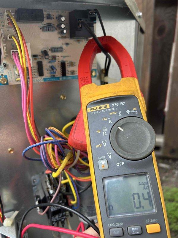 Completed scheduled Care Plan maintenance tune-up on heat pump air handler system located in kitchen closet. Inspected evaporator coil and found moderate dust and debris accumulation on aluminum fins; performed electrical diagnostics using clamp meter, measuring current draw at 0.4 amps AC on system components and verifying proper operation of control board circuits. Customer-provided filters noted; all system components operating within normal parameters upon completion of preventive maintenance service.