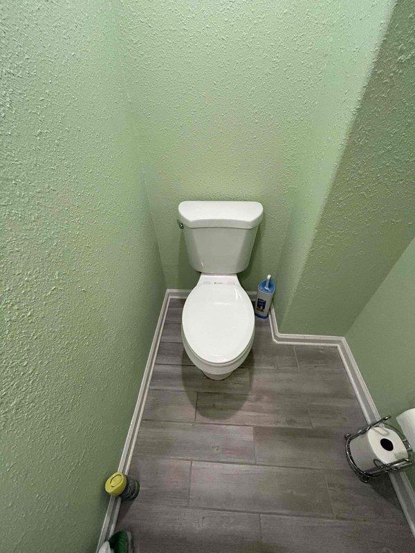 Responded to service call for toilet requiring internal component replacement. Upon arrival, inspected residential toilet in powder room with standard two-piece configuration. Assessed existing flush valve and fill valve assembly for wear and malfunction. Replaced complete toilet tank internal components including flapper, flush valve, fill valve, and associated hardware. Tested flush mechanism for proper operation, verified water level adjustment, and checked for leaks at all connection points. Confirmed toilet restored to full working order with proper flushing and refill cycle.