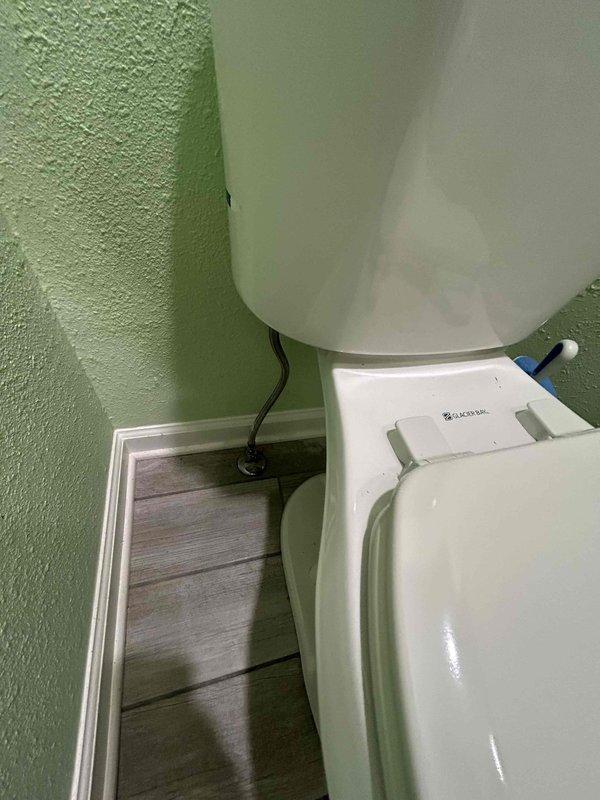 Responded to service call for toilet requiring internal component replacement. Upon arrival, inspected residential toilet in powder room with standard two-piece configuration. Assessed existing flush valve and fill valve assembly for wear and malfunction. Replaced complete toilet tank internal components including flapper, flush valve, fill valve, and associated hardware. Tested flush mechanism for proper operation, verified water level adjustment, and checked for leaks at all connection points. Confirmed toilet restored to full working order with proper flushing and refill cycle.