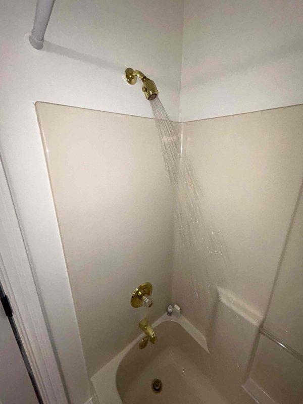 Completed routine plumbing inspection of residential bathroom fixtures. Tested water flow and pressure at sink faucet and shower system, verified proper operation of all valves and controls, and confirmed no visible leaks or drainage issues. All fixtures found to be functioning properly with adequate water pressure and temperature control.