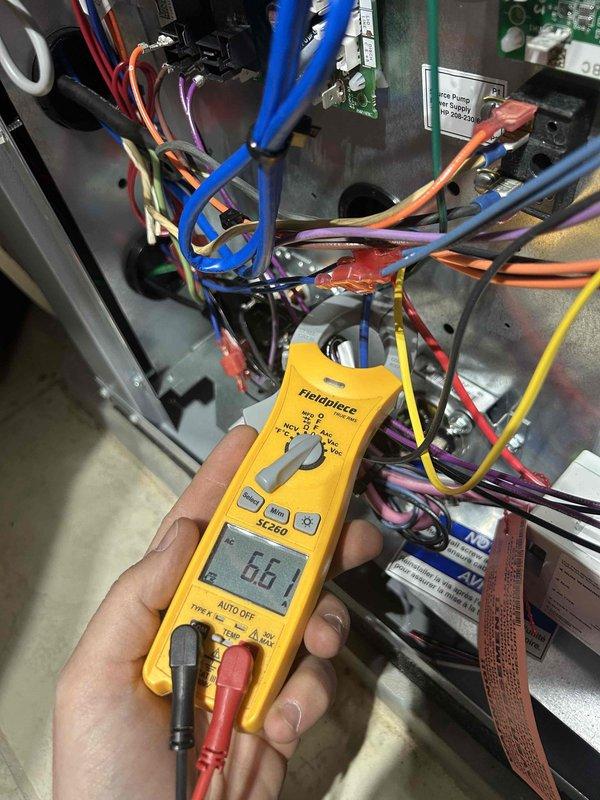 Responded to callback for geothermal system with two attic-mounted air handlers experiencing intermittent operation. Performed electrical diagnostics on control board of master bedroom zone unit that required manual resets to restore operation. Verified voltage readings at control panel and tested system components with multimeter to identify intermittent control issue. Removed all programmed schedules from Nest thermostats per customer request to eliminate unwanted temperature setpoint changes. Both zones tested and operational at time of departure.
