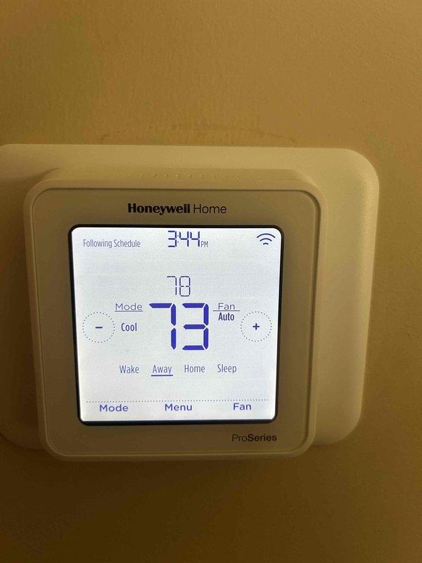 Completed comprehensive care plan tune-up on heat pump and air handler system located in crawlspace. Performed full system inspection and maintenance procedures, verified proper operation of Honeywell Home ProSeries WiFi thermostat displaying cooling mode at 73°F setpoint, and confirmed functionality of REME-HALO Zero air purification system with eGHP-Cell technology. Customer advised that return air filters in sizes 20x30x1 and 14x20x1 are not included in maintenance plan and should be replaced as needed.