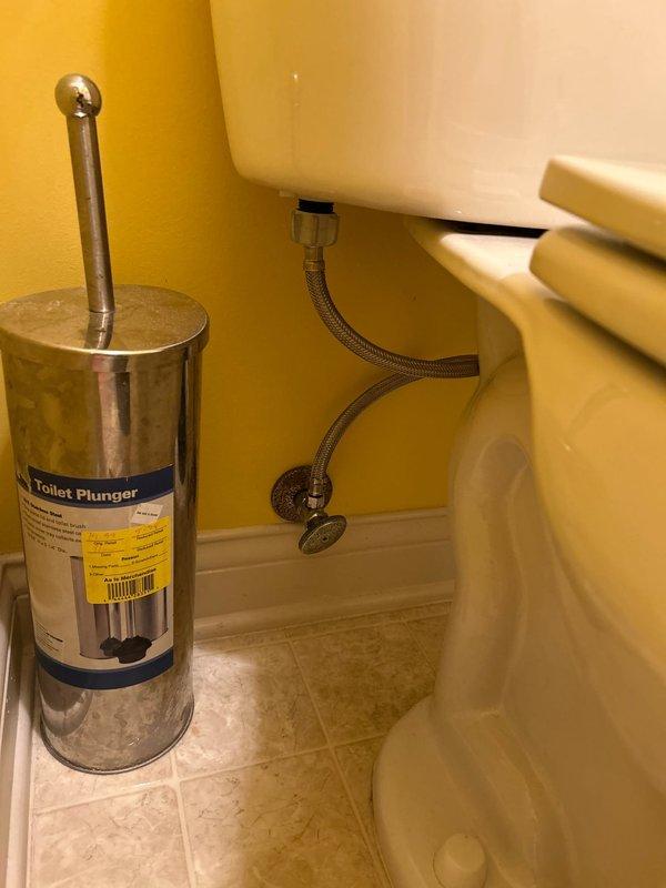 Responded to service call for guest bathroom toilet running constantly. Upon inspection, identified faulty flush valve and fill valve components with visible mineral buildup affecting proper operation. Removed tank lid and assessed internal mechanisms, noting deteriorated flapper seal and compromised fill valve causing continuous water flow. Recommended replacement of flush valve assembly and fill valve to restore proper function and prevent water waste.