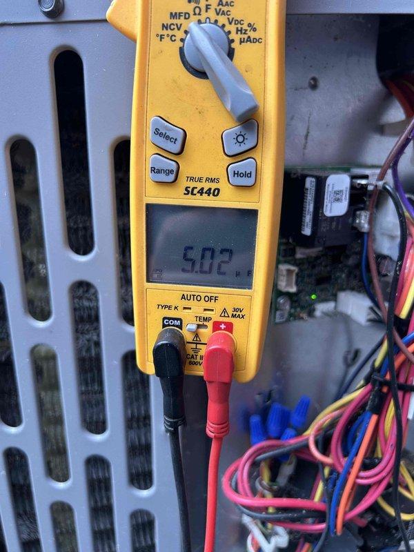 Responded to callback for upstairs furnace not operating following recent repair. Upon arrival, performed diagnostic testing of 3-year-old unit using digital multimeter and temperature measurements. Verified supply air temperature at 70.7°F at register grille and conducted voltage testing at control board, measuring 50.7V at electrical connections. Inspected control board wiring harnesses and LED indicators to identify root cause of no-heat condition. Completed troubleshooting and restored unit to proper operation.
