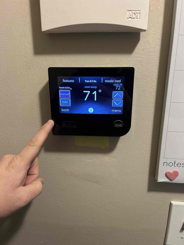 Completed preventative maintenance tune-up on dual HVAC system consisting of two gas furnaces and two air conditioning units as part of Care Plan service. Performed comprehensive inspection and maintenance on furnace located in basement and attic-mounted unit, with both systems found to be operating within normal parameters. Verified thermostat functionality showing cooling mode active at 71°F with setpoint of 72°F, confirmed proper system communication and temperature control response.