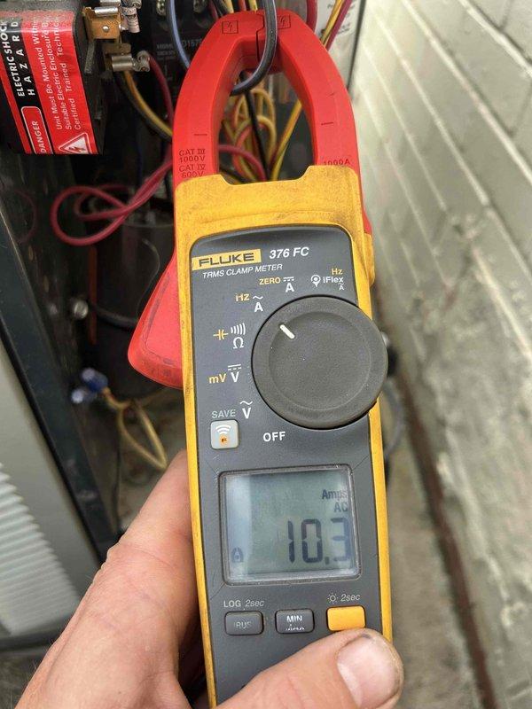 Completed comprehensive air conditioning tune-up and performance evaluation on ground floor unit located in basement as part of preventative maintenance care plan. Performed electrical diagnostics including capacitor testing which measured 29.2 µF and amperage draw verification at 10.3 amps, confirming system operating within manufacturer specifications.