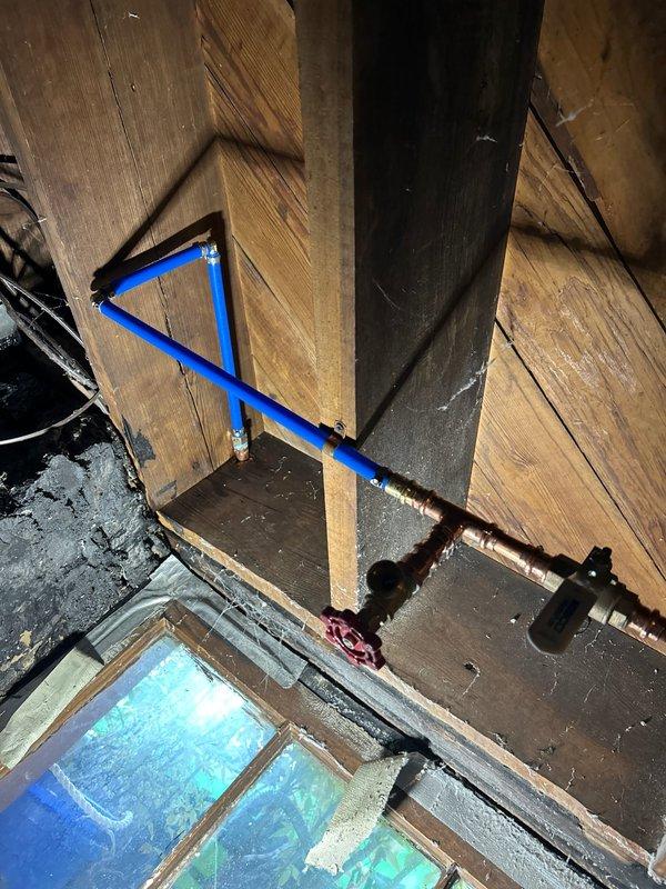 Responded to report of potential burst pipe or water leak in basement with water intrusion down wall and standing water present. Upon arrival, confirmed leak was not active with water supply turned off. Conducted thorough investigation of basement plumbing system to locate source of water intrusion. Inspected exposed piping, including copper supply lines with shutoff valves in crawl space area near structural framing. Identified leak source and assessed extent of water damage to surrounding areas. Additionally, completed installation of new kitchen faucet assembly with dual handles, high-arc spout, side spray attachment, and coordinating soap dispenser as requested. Verified all connections for proper operation and tested system under pressure to confirm no additional leaks present before restoring water service to residence.