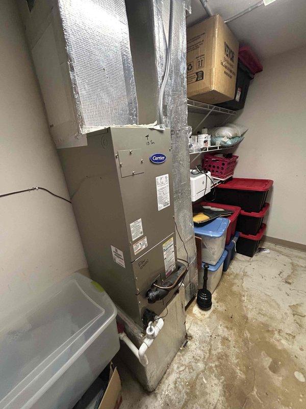 Responded to no cooling complaint on commercial HVAC system following initial maintenance findings. Performed diagnostic evaluation on multiple air handler units including Units 6 and T in upper hallways, confirming filter replacements and identifying potential low refrigerant charge requiring further investigation. Inspected Unit 13 in back hallway, verified all electrical amperage draws within specification, confirmed proper system pressures and temperature differential across coil, cleared condensate drain line, replaced air filter, and identified outdoor condenser fan motor bearing wear causing audible rattling noise requiring future replacement to prevent motor failure.