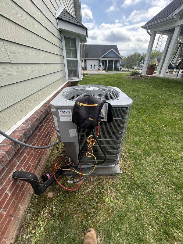Completed monthly spring/summer maintenance on Payne heat pump system with air handler located in attic. Performed comprehensive system diagnostics using Fieldpiece gauges to verify refrigerant pressures and temperatures, inspected outdoor condenser unit operation, and checked all electrical connections. Confirmed system operating within manufacturer specifications and replaced 20x20x1 air filter in attic air handler to maintain proper airflow and indoor air quality.