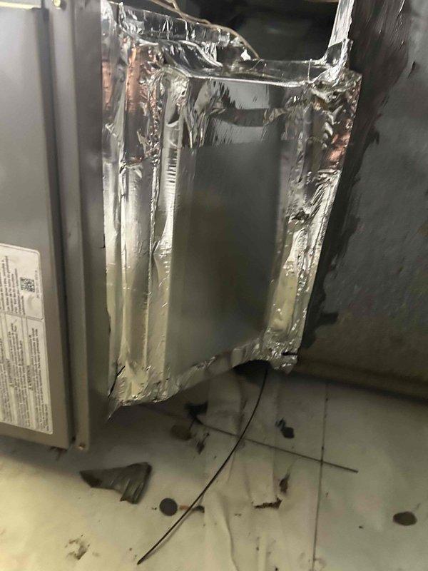 Completed full replacement of residential gas furnace with Bryant 80% efficiency single-stage Legacy Series unit, model 800SB42090M17, rated at 90,000 BTU with 3.5 ton capacity. Removed and properly disposed of existing furnace equipment from attic installation location. Installed new furnace with transition to existing evaporator coil, standard-sized air filter rack, and connected to existing flue piping system. Completed all electrical connections including disconnect switch, installed gas shut-off switch with flexible gas line connector, and verified flame roll-out protection safety devices. Utilized existing thermostat and wiring. Protected crawlspace barrier during equipment transport using PVC pipe as rolling surface to prevent damage. Obtained necessary permits and ensured all work met current code compliance standards. System tested and operational upon completion.