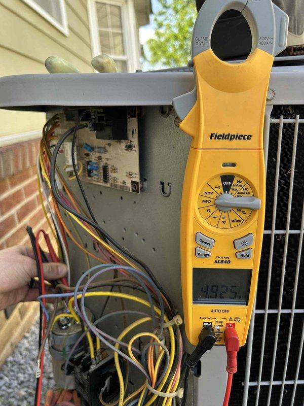 Completed monthly spring/summer maintenance on heat pump and air handler system located in attic with garage access. Performed comprehensive electrical diagnostics using clamp meter, verifying amperage draws and capacitor readings on both outdoor condensing unit and indoor air handler, with all measurements within manufacturer specifications. Replaced 20x20x1 air filter and confirmed all system components operating properly for continued reliable cooling performance.
